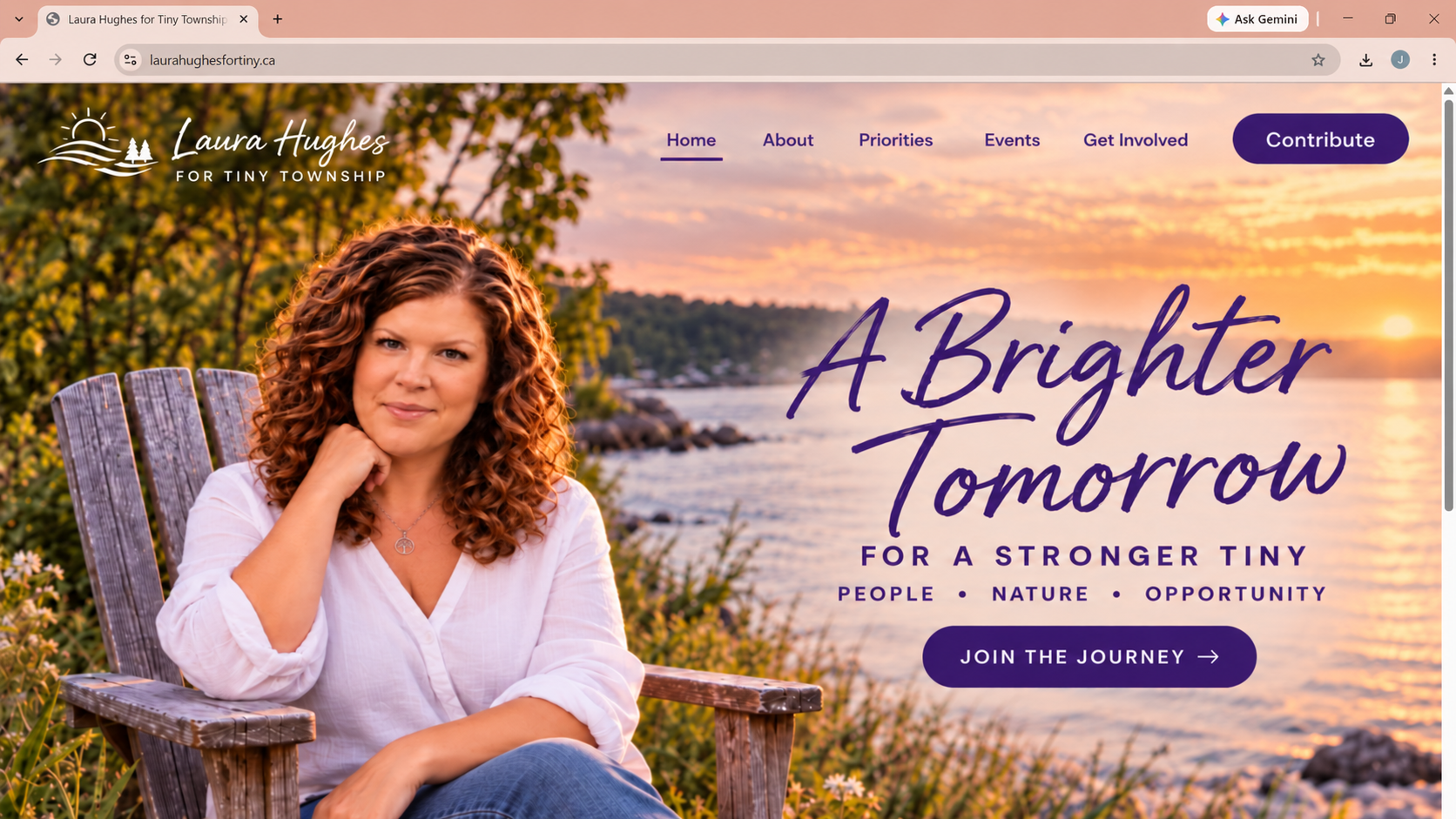 Laura Hughes by the water at sunset with campaign message A Brighter Tomorrow for a Stronger Tiny
